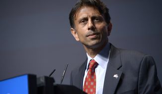 ** FILE ** In this Aug. 30, 2013, file photo, Louisiana Gov. Bobby Jindal addresses attendees during the Americans for Prosperity Foundation&#39;s Defending the American Dream Summit in Orlando, Fla. (AP Photo/Phelan M. Ebenhack)