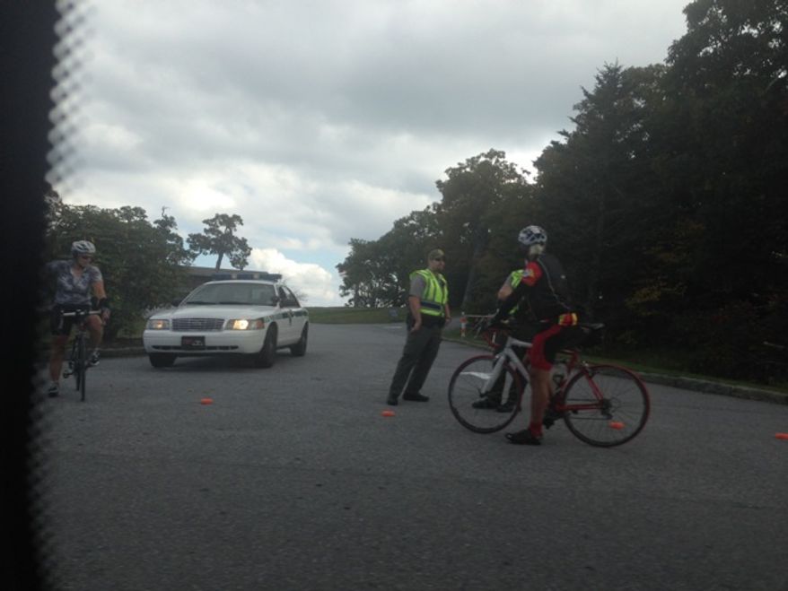Park rangers on Friday were turning away people who want to visit the Pisgah Inn on the Blue Ridge Parkway in an effort to enforce the National Park Service's decision to shut down the private establishment during the government shutdown. A Times reader sent in photos of the rangers blocking the entrance. (Image provided by Sloane Salzman)
