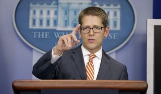 White House press secretary Jay Carney gestures during his daily news briefing at the White House in Washington, Friday, Oct. 4, 2013, where he took questions regarding the government shutdown. (AP Photo/Pablo Martinez Monsivais)