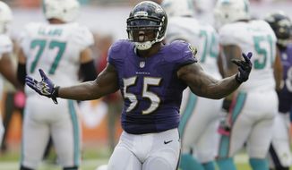 Baltimore Ravens outside linebacker Terrell Suggs (55) celebrates after sacking Miami Dolphins quarterback Ryan Tannehill (17) during the second half of an NFL football game, Sunday, Oct. 6, 2013, in Miami Gardens, Fla. The Ravens defeated the Dolphins 26-23. (AP Photo/Wilfredo Lee)