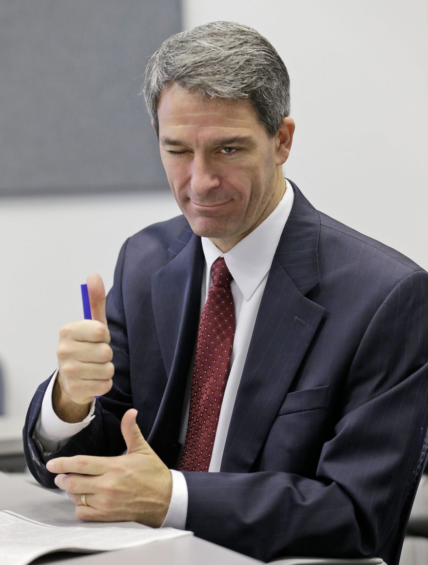 Republican gubernatorial candidate Kenneth T. Cuccinelli II holds an "Obamacare roundtable" to discuss effects of the nation's Affordable Care Act. (Associated Press)