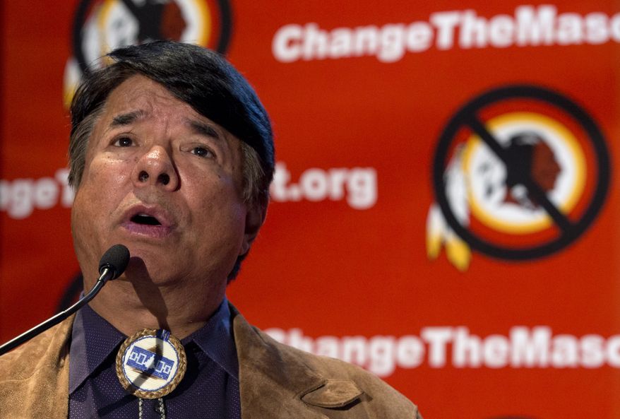 Ray Halbritter, National Representative of the Oneida Indian Nation, speaks during the Oneida Indian Nation's Change the Mascot symposium, Monday, Oct. 7, 2013, in Washington, calling for the Washington Redskins NFL football team to change its name. President Barack Obama suggested that the owner of the Washington Redskins football team consider changing its name because, the president said, the current name offends "a sizable group of people." (AP Photo/Carolyn Kaster)