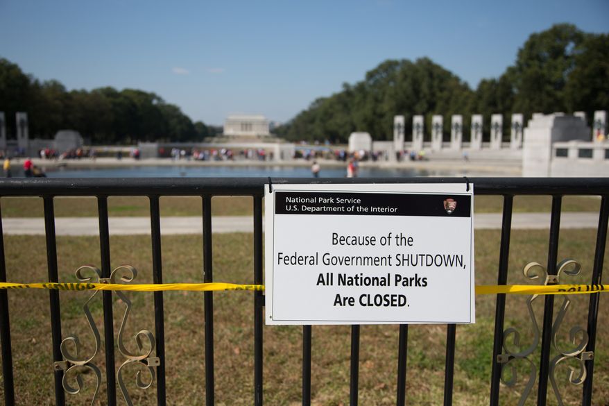 Barricades block the entrance to the World War II memorial as all park service owned buildings and monuments are closed due to the government shutdown in Washington, DC., Tuesday, October 1, 2013. (Andrew S Geraci/The Washington Times)
