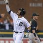 Detroit Tigers designated hitter Victor Martinez looks skyward after hitting a solo home run during the seventh inning of Game 4 of baseball&#39;s American League division series against the Oakland Athletics in Detroit, Tuesday, Oct. 8, 2013. (AP Photo/Lon Horwedel)