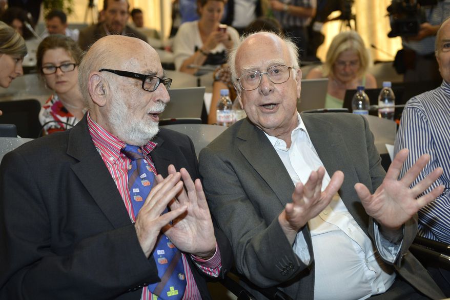 ** FILE ** In this Wednesday, July 4, 2012, file photo Belgian physicist Francois Englert, left, and British physicist Peter Higgs right, answer journalist's question about the scientific seminar to deliver the latest update in the search for the Higgs boson at the European Organization for Nuclear Research (CERN) in Meyrin near Geneva, Switzerland. Francois Englert and Peter Higgs were awarded the Nobel physics prize on Tuesday, Oct. 8, 2013. (AP Photo/Keystone/Martial Trezzini, File)