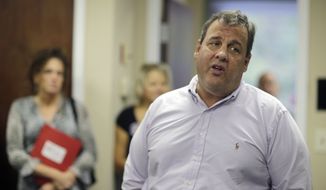 New Jersey Gov. Chris Christie addresses some campaign workers in East Brunswick, N.J., Tuesday, Oct. 8, 2013. Asked Tuesday why voters should give him another term, Christie said he&#39;s been honest about the state&#39;s problems and worked with Democrats to find bipartisan solutions. (AP Photo/Mel Evans)