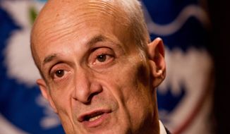 Michael Chertoff, a former Homeland Security secretary, says if more immigrants were granted deferred action, it doesn&#39;t solve the problem for businesses that would have to decide whether to hire them and could halt momentum toward a full legalization solution. (associated press photographs)