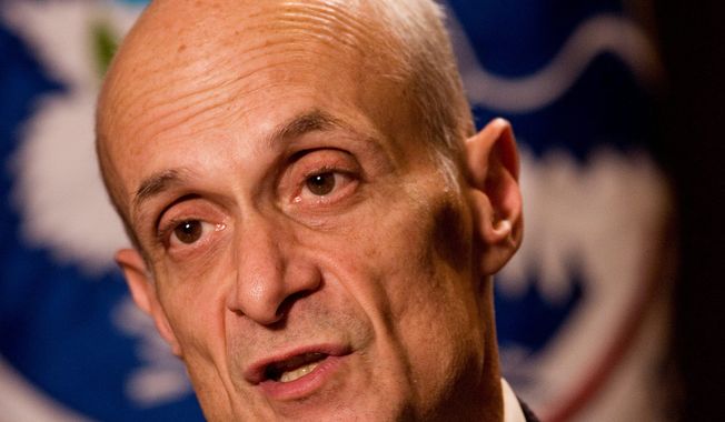Michael Chertoff, a former Homeland Security secretary, says if more immigrants were granted deferred action, it doesn&#x27;t solve the problem for businesses that would have to decide whether to hire them and could halt momentum toward a full legalization solution. (associated press photographs)