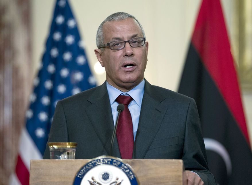 ** FILE ** In this March 13, 2013, file photo, Libyan Prime Minister Ali Zidan speaks during a joint news conference with U.S. Secretary of State John Kerry at the State Department in Washington. A government official says Libyan Prime Minister Ali Zeidan was kidnapped by gunmen early Thursday morning, Oct. 10, 2013, from a hotel in Tripoli where he resides. (AP Photo/Jose Luis Magana, File)