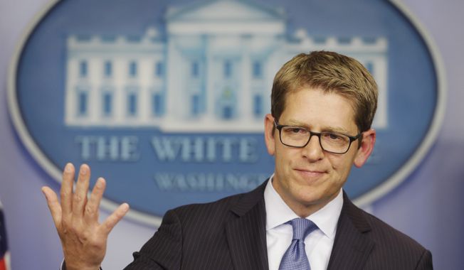 White House press secretary Jay Carney throws his hands up when asked about President Obama&#x27;s plans for the following week during his daily news briefing at the White House in Washington, Friday, Oct. 11, 2013. Carney took questions regarding the budget and partial government shutdown. (AP Photo/Pablo Martinez Monsivais)