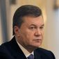 Ukrainian President Viktor Yanukovych during their meeting with EU Commissioner for Enlargement and European Neighborhood policy Stefan Fule in Kiev, Ukraine, Friday, Oct. 11, 2013.Ukrainian President Viktor Yanukovych is hoping for a quick solution to the problem the jailed former premier Yulia Tymoshenko, whose release is a key condition for a landmark agreement with the European Union.(AP Photo/Sergei Chuzavkov,Pool)