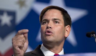 Sen. Marco Rubio, Florida Republican, gestures as he speaks at the Values Voter Summit, sponsored by the Family Research Council Action, on Friday, Oct. 11, 2013, in Washington. (AP Photo/Jose Luis Magana)