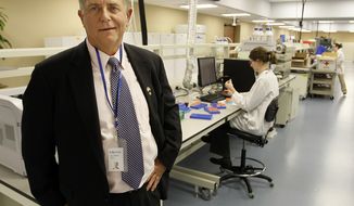 **FILE** Toxicologist David Black is shown in a lab of his company, Aegis Sciences Corp., in Nashville, Tenn., on Dec. 9, 2008. (Associated Press)