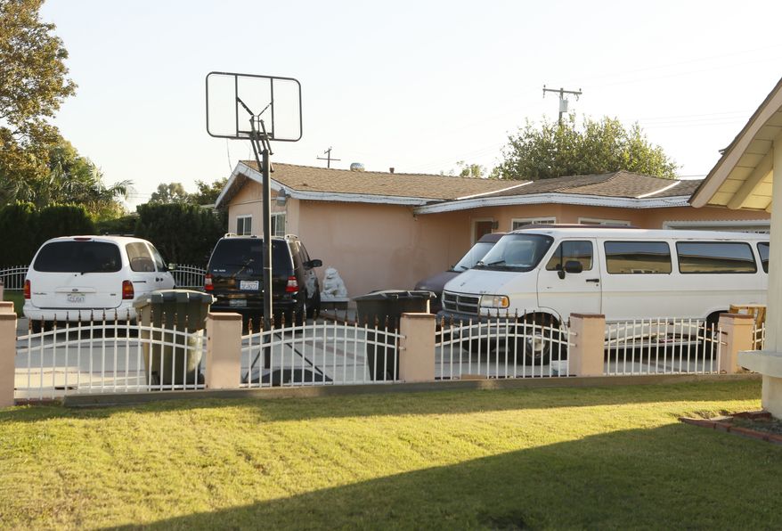 The home of the family of Sinh Vinh Ngo Nguyen is seen in Garden Grove, Calif., on Oct. 11, 2013. Sinh Vinh Ngo Nguyen, 24, of Garden Grove, was arrested earlier in the day in Santa Ana, Calif., while waiting to board a bus to Mexico, the FBI said in a statement. He was charged with attempting to provide material support to al Qaeda and lying on a U.S. passport application to facilitate an act of terrorism. (Associated Press)