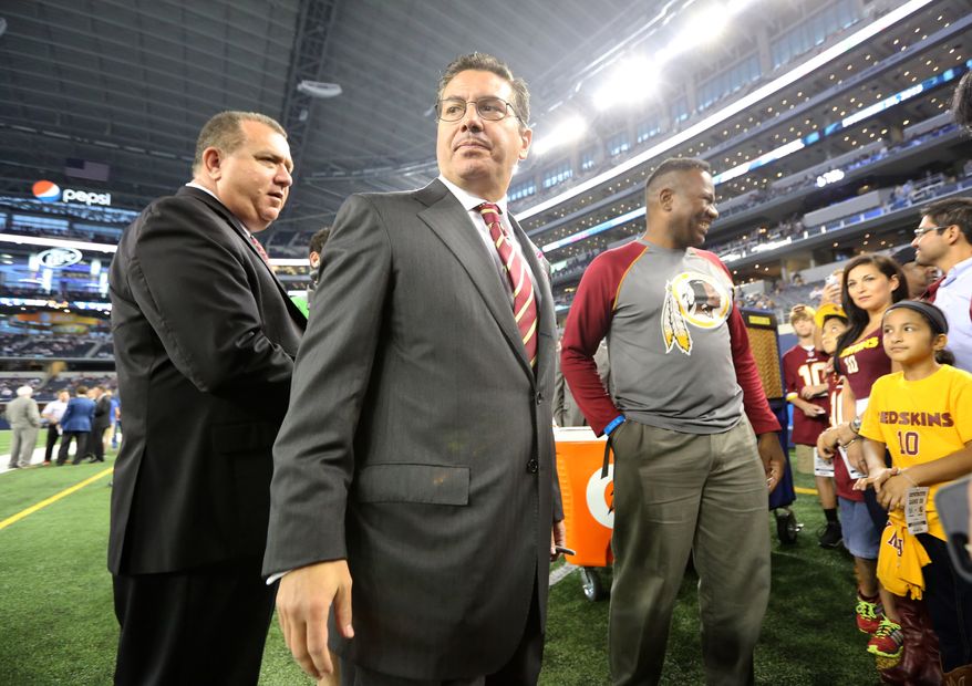 Washington Redskins owner Daniel Snyder visits with fans before an NFL football game against the Dallas Cowboys, Sunday, Oct. 13, 2013, in Arlington, Texas. (AP Photo/LM Otero)