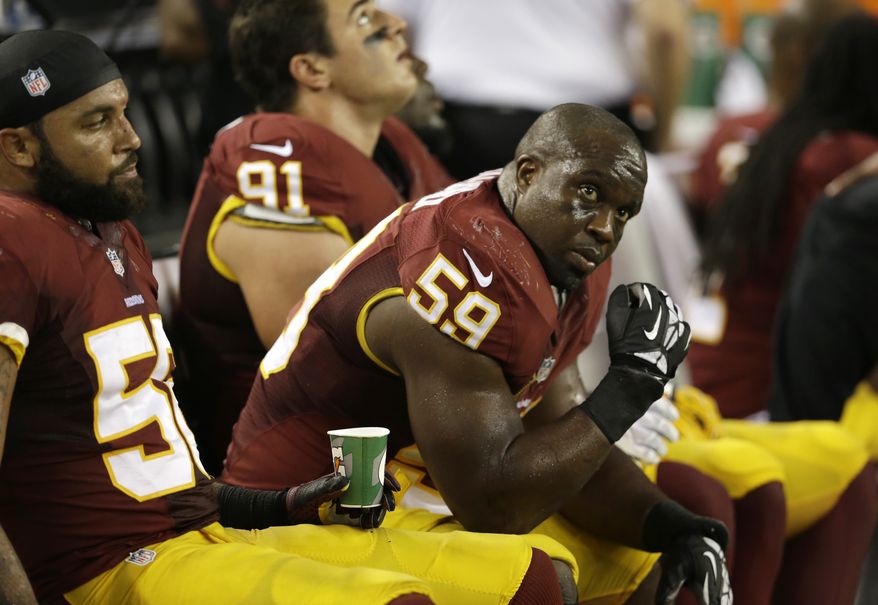 Washington Redskins inside linebacker London Fletcher (59) sits on the bench in the second half of an NFL football game against the Dallas Cowboys Sunday, Oct. 13, 2013, in Arlington, Texas. (AP Photo/LM Otero)