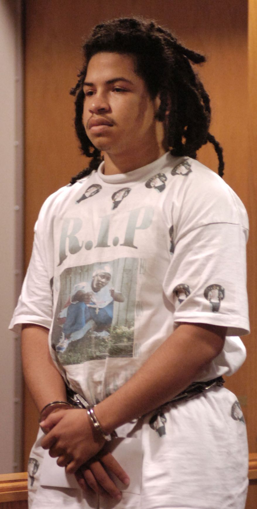 ** FILE ** In this Dec. 1, 2007, file photo, Eric Rivera Jr., 17, listens to Lee Circuit Judge Hugh Starnes during his first appearance at the Lee County Justice Center in Fort Myers, Fla. (AP Photo/The Fort Myers News-Press, Stephen Hayford)