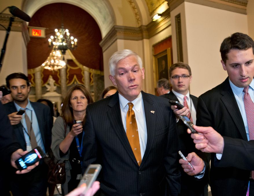 House Rules Committee Chairman Pete Sessions, Texas Republican, emerges from the office of House Speaker John A. Boehner, Ohio Republican, telling reporters that there will not be a budget vote. Time is growing short as House Republicans pushed for passage of legislation to prevent a threatened Treasury default. (Associated Press)
