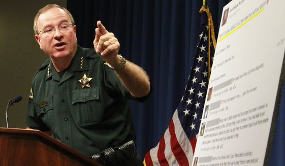 Polk County Sheriff Grady Judd talks about the events leading up to the arrest over the weekend of two juvenile girls in a Florida bullying case at a press conference in Winter Haven, Fla., Monday, Oct. 15, 2013. (AP Photo/The Ledger, Calvin Knight) ** FILE **