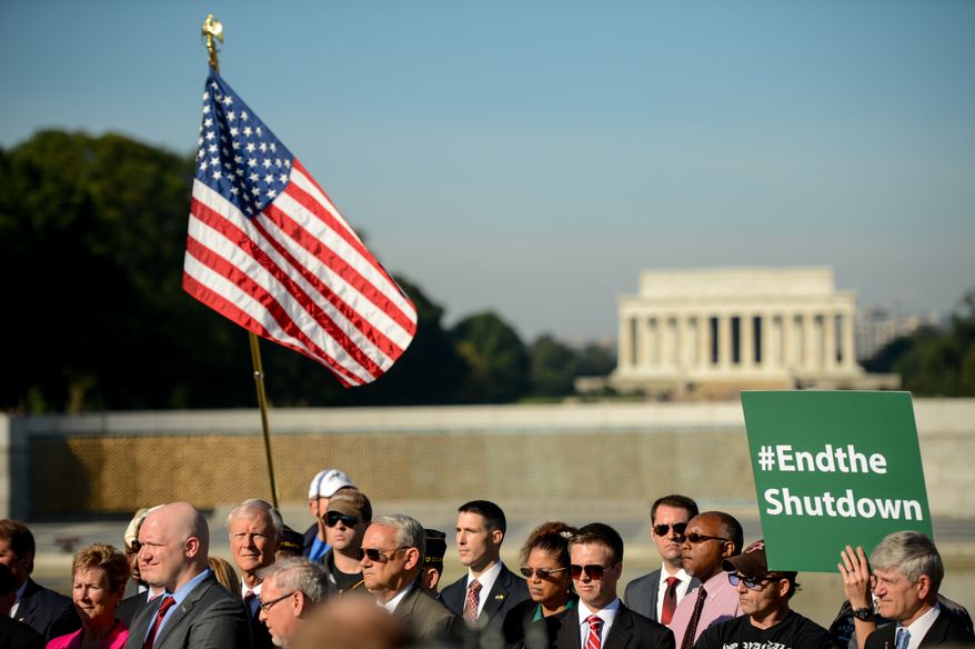 Veterans of Foreign Wars leaders and representatives of other veteran and military service organizations call for an end to the federal government shutdown at a rally at the World War II Memorial, Washington, D.C., Washington, D.C., Tuesday, October 15, 2013. (Andrew Harnik/The Washington Times)