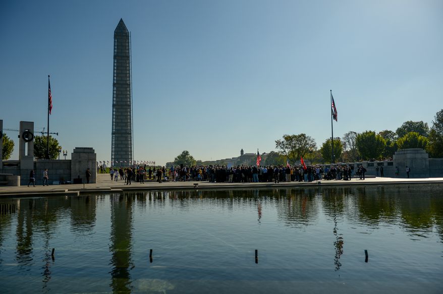 Veterans of Foreign Wars leaders and representatives of other veteran and military service organizations call for an end to the federal government shutdown at a rally at the World War II Memorial, Washington, D.C., Washington, D.C., Tuesday, October 15, 2013. (Andrew Harnik/The Washington Times)