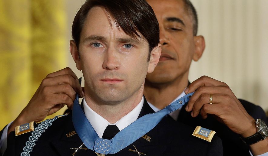 AP10ThingsToSee - President Barack Obama awards the Medal of Honor to former Army Capt. William D. Swenson of Seattle, Wash., during a ceremony in the East Room at the White House in Washington, Tuesday, Oct. 15, 2013. Swenson was being awarded the Medal of Honor for his actions in a lengthy battle against Taliban insurgents in the Ganjgal valley near the Pakistan border on Sept. 8, 2009, which claimed the lives of five Americans, 10 Afghan army troops and an interpreter. (AP Photo/Pablo Martinez Monsivais, File)