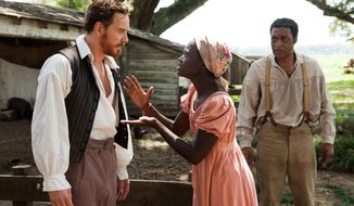Michael Fassbender, left, Lupita Nyong&#39;o, and Chiwetel Ejofor, right, in a scene from &quot;12 Years A Slave.&quot; (AP Photo/Fox Searchlight, Francois Duhamel)