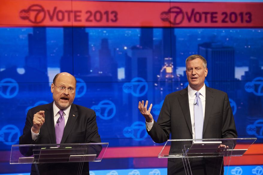 Joe Lhota (left) and Bill de Blasio, the Republican and Democratic candidates, respectively, for New York City mayor, participate in their first televised debate at the WABC-TV (Channel 7) studios on Tuesday, Oct. 15, 2013, in New York. The debate, the first of three before the Nov. 5 general election, was hosted by the New York Daily News, WABC-TV, Noticias 41 Univision and the League of Women Voters. (AP Photo/The Daily News, James Keivom, Pool)