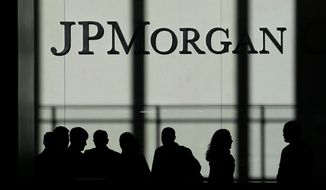 ** FILE ** The JPMorgan Chase &amp; Co. logo is displayed at their headquarters in New York, Monday, Oct. 21, 2013. (AP Photo/Seth Wenig)