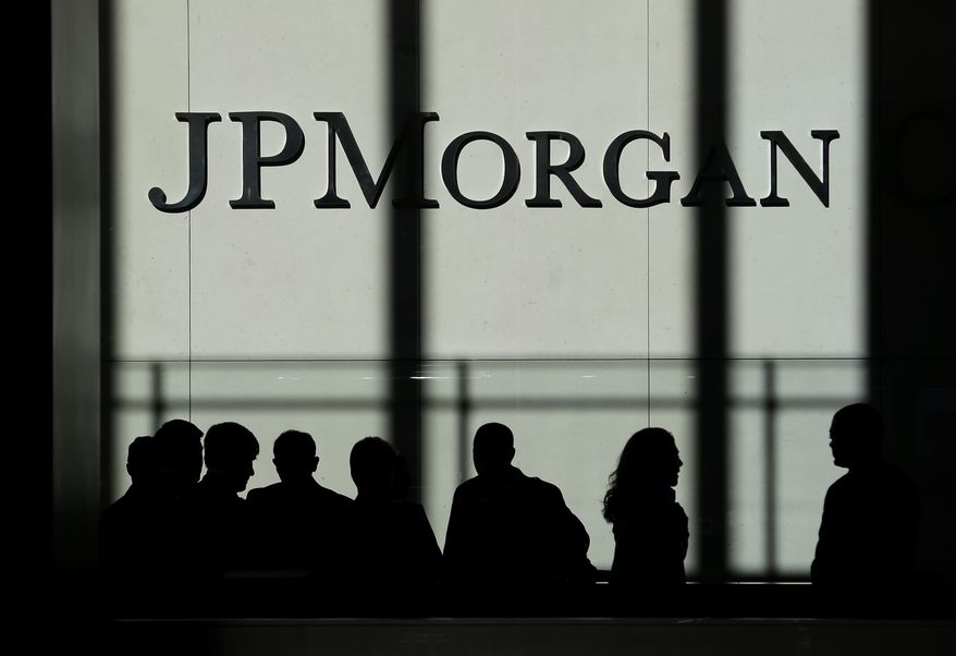 ** FILE ** The JPMorgan Chase & Co. logo is displayed at their headquarters in New York, Monday, Oct. 21, 2013. (AP Photo/Seth Wenig)