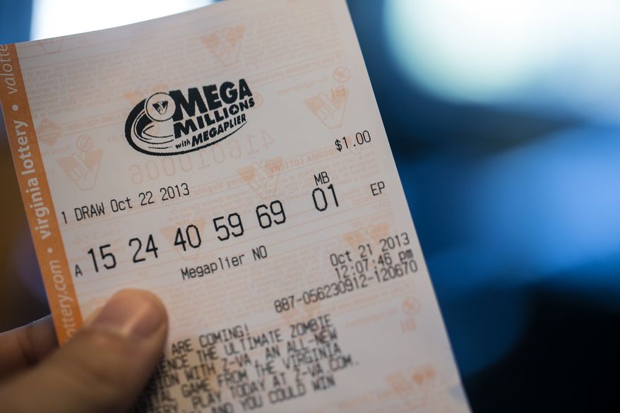 Mega Millions ticket holders will now have a better chance at winning due to an increase in numbers (up to 75), now 1-in-14.71 have a chance to win any prize, in Alexandria, VA., Monday, October 21, 2013. (Andrew S Geraci/The Washington Times)