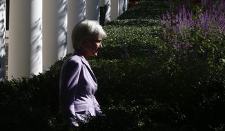 Health and Human Services Secretary Kathleen Sebelius arrives in the Rose Garden of the White House in Washington, Monday, Oct. 21, 2013, before President Barack Obama spoke on the initial rollout of the health care overhaul. Obama acknowledged that the widespread problems with his health care law&#39;s rollout are unacceptable, as the administration scrambles to fix the cascade of computer issues. (AP Photo/Charles Dharapak)