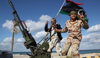 **FILE** Libyan militias from towns throughout the country&#39;s west parade through Tripoli, Libya, on Feb. 14, 2012. (Associated Press)