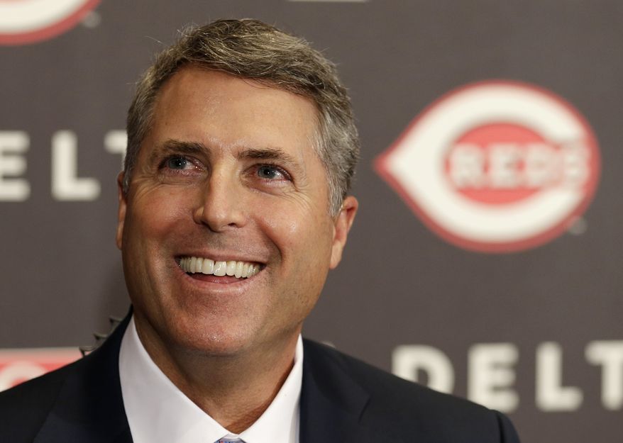 Bryan Price smiles after being named manager of the Cincinnati Reds, Tuesday, Oct. 22, 2013, at a news conference in Cincinnati. Price, who had been the National League baseball team's pitching coach, was signed to a three year contract. Price replaced Dusty Baker. (AP Photo/Al Behrman)