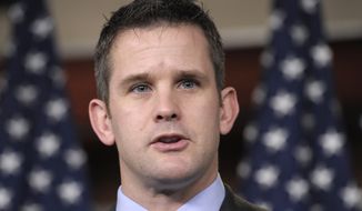 Rep. Adam Kinzinger, Illinois Republican, speaks during a news conference on Capitol Hill in Washington in this Dec. 19, 2011, file photo. (Associated Press)