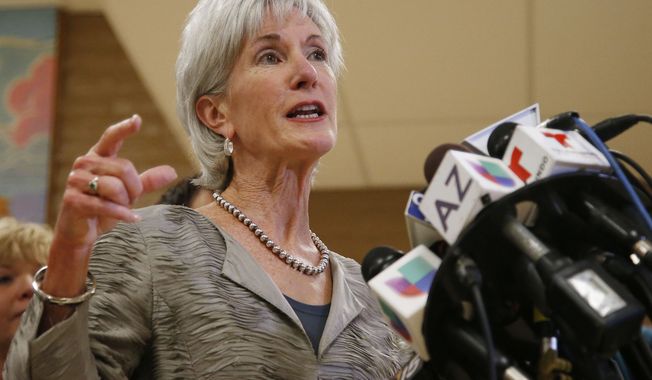 Health and Human Services Secretary Kathleen Sebelius answers a question as she holds a news conference at the Wesley Health Center, one of two facilities she visited where locals can get help navigating the Affordable Care Act on Thursday Oct. 24, 2013, in Phoenix, amid calls for her resignation after the rollout of insurance exchanges under the new federal health care law. (AP Photo/Ross D. Franklin)