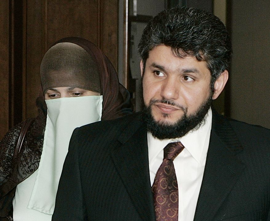 FILE -- This May 12, 2006 file photo shows Homaidan al-Turki, right, and his wife Sarah Khonaizan as they arrive for a hearing at the Arapahoe County courthouse in Centennial, Colo. Homaidan al-Turki, a Saudi national serving eight years in prison in Colorado on a sexual assault conviction, appeared at a hearing today Oct.24, 2013, to ask a judge to release him from prison and allow him to serve probation instead. He seeks to be deported to his home country to serve the rest of his sentence.(AP Photo/Ed Andrieski, File)