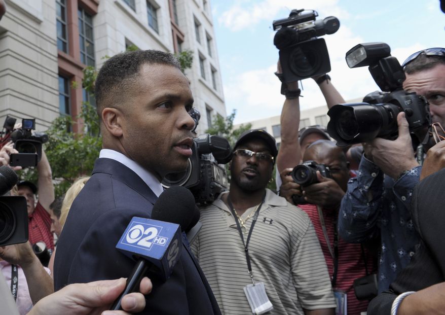 FILE - In this Wednesday, Aug. 14, 2013, file photo, former Illinois Rep. Jesse Jackson Jr., leaves federal court in Washington. Prison-bound Jackson plans to sell his home in Washington to help pay $750,000 in penalties stemming from his sentence for illegally spending campaign funds on personal items. (AP Photo/Susan Walsh, File)