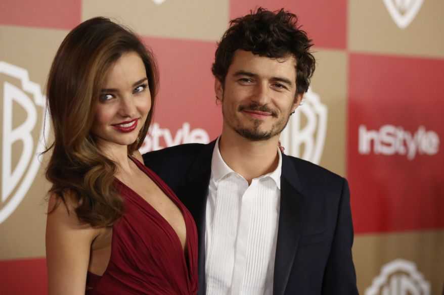 FILE - In this Jan. 13, 2013 file photo, Miranda Kerr and Orlando Bloom arrive at the InStyle and Warner Bros. Golden Globe After Party at the Beverly Hilton Hotel in Beverly Hills, Calif. Bloom and Kerr confirmed the end of their marriage Friday, Oct. 25, 2013, saying they have been “amicably separated for the past few months.” The couple, who were married in 2010, have a 2-year-old son, Flynn. (Photo by Matt Sayles/Invision/AP, File)