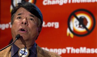 FILE - In this Oct. 7, 2013, file photo, Oneida Indian Nation leader Ray Halbritter speaks in Washington, calling for the Washington Redskins NFL football team to change its name. Oneida Indian officials who oppose the Redskins nickname as a slur will meet with NFL officials next week in New York, a tribe spokesman said Friday, Oct. 25, 2013. (AP Photo/Carolyn Kaster, File)