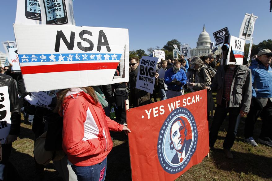 **FILE** Demonstrators protest outside of the U.S. Capitol in Washington during a rally to demand that the U.S. Congress investigate the National Security Agency&#39;s mass surveillance programs Saturday, Oct. 26, 2013. (AP Photo/Jose Luis Magana)