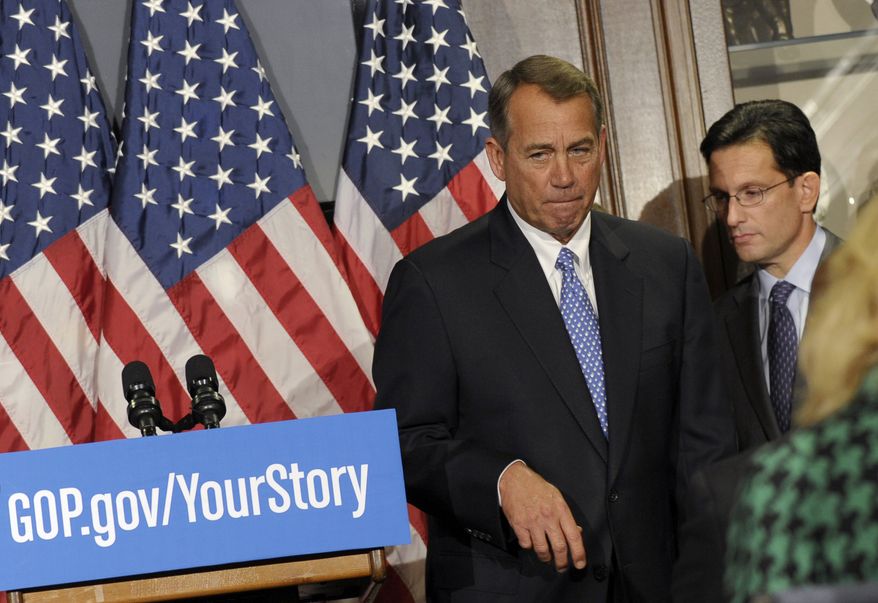 FILE - In this Oct. 23, 2013, file photo House Speaker John Boehner of Ohio, left, and House Majority Leader Eric Canton of Va., right, leave after a news conference, following a meeting at the Republican National Committee offices on Capitol Hill in Washington. A year after losing a presidential race many Republicans thought was winnable, the GOP arguably is in worse shape than before, struggling to control tensions between its tea party and establishment wings, and watching the party's approval ratings hit record lows. (AP Photo/Susan Walsh, File)