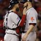 Boston Red Sox catcher David Ross talks to starting pitcher Jon Lester during the eighth inning of Game 5 of baseball&#x27;s World Series against the St. Louis Cardinals Monday, Oct. 28, 2013, in St. Louis. (AP Photo/Jeff Roberson) 