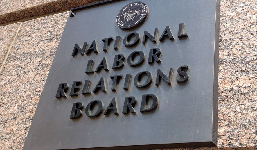 The sign for the National Labor Relations Board is seen outside the organization&#39;s headquarters in downtown Washington on July 17, 2013. (Associated Press, File)