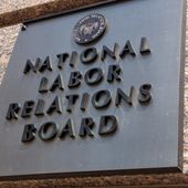 The sign for the National Labor Relations Board is seen outside the organization&#x27;s headquarters in downtown Washington on July 17, 2013. (Associated Press, File)