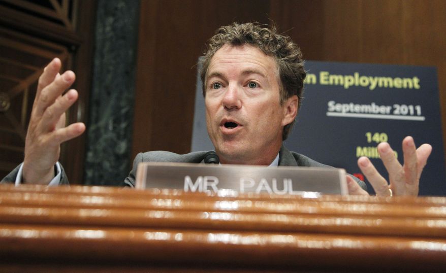 File- This Oct. 18, 2011 file photo shows Senate Small Business and Entrepreneurship Committee member Sen. Rand Paul, R-Ky., questioning Treasury Secretary Timothy Geithner on Capitol Hill in Washington. In just half a term, the Kentucky Republican has shaken up Congress and in some ways the country with his brand of libertarian populism, filibustering President Barack Obama’s CIA director earlier this year and leading the fight against authorizing U.S. military action in Syria. (AP Photo/Manuel Balce Ceneta, File)