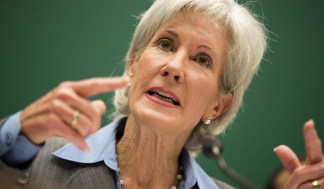 ** FILE ** Health and Human Services Secretary Kathleen Sebelius testifies on Capitol Hill in Washington, Wednesday, Oct. 30, 2013, before the House Energy and Commerce Committee hearing on the difficulties plaguing the implementation of the Affordable Care Act. (AP Photo/ Evan Vucci)