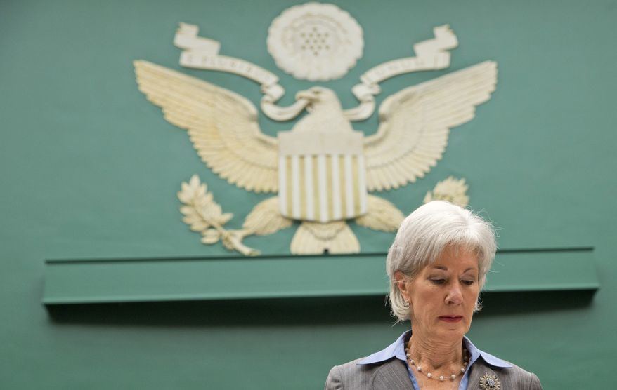 Health and Human Services Secretary Kathleen Sebelius pauses on Capitol Hill in Washington, Wednesday, Oct. 30, 2013, prior to testifying before the House Energy and Commerce Committee hearing on the difficulties plaguing the implementation of the Affordable Care Act. Sebelius, President Barack Obama's top health official faced tough questioning by a congressional committee Wednesday that will demand she explain how the administration stumbled so badly in its crippled online launch of the president's health care overhaul. (AP Photo/ J. Scott Applewhite)