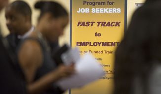 Job seekers line up to talk with recruiters during a job fair in Atlanta on Thursday, May 30, 2013. 
(AP Photo/John Amis)