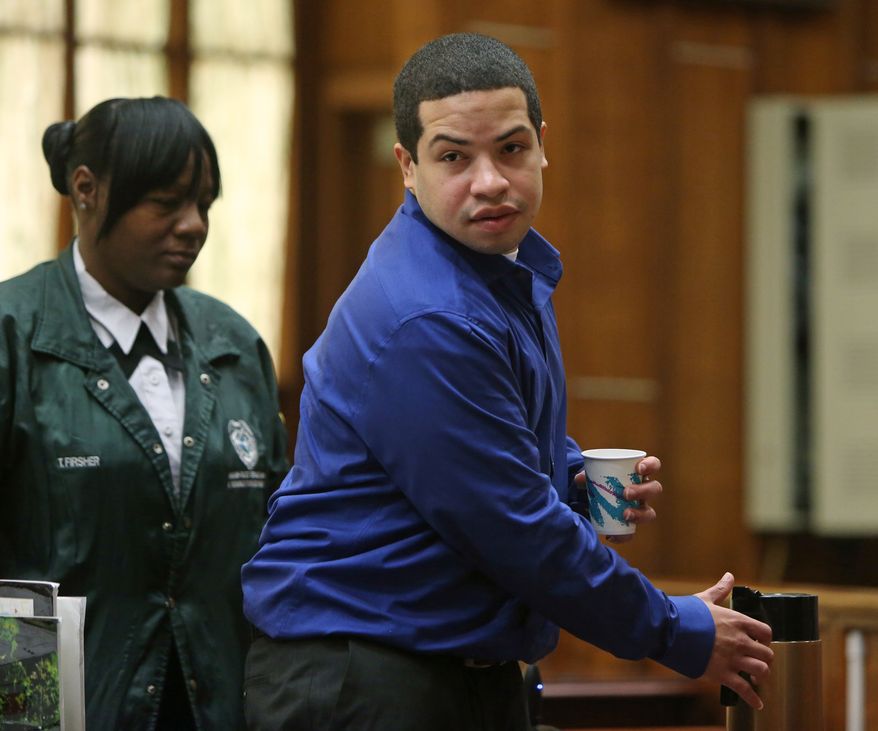 Eric Rivera Jr. leaves the courtroom on Friday, Nov. 1, 2013, in Miami. A South Florida jury resumed deliberations in Rivera's case Friday. Rivera has been charged in the fatal shooting of Washington Redskins star Sean Taylor during an ill-fated 2007 burglary. (AP Photo/The Miami Herald, Walter Michot) MAGS OUT